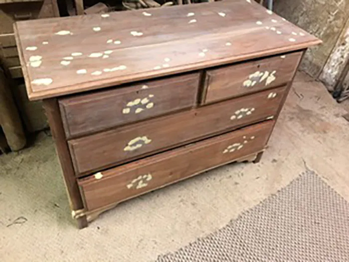 Wooden chest of drawers before
