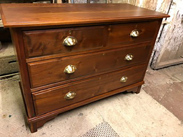 Wooden chest of drawers after